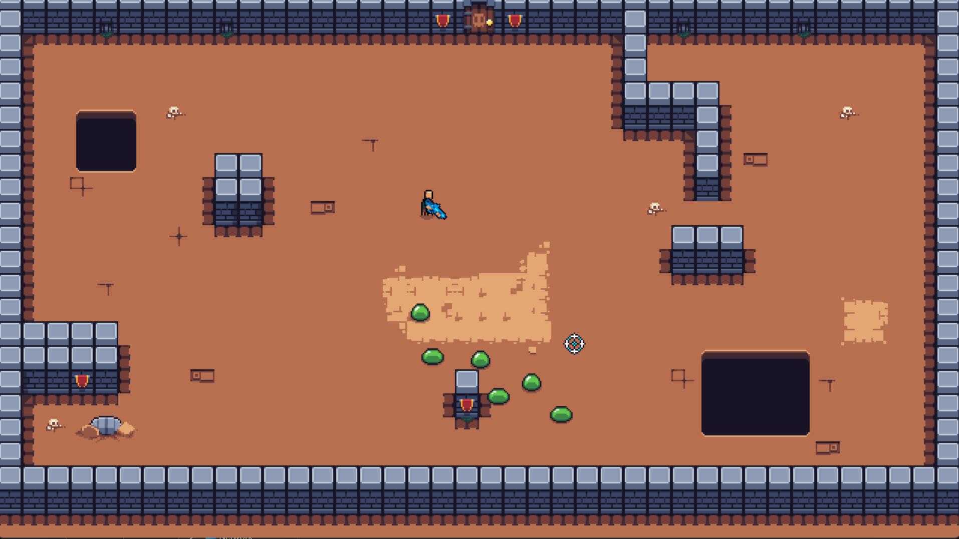 A top-down pixel-art dungeon room with stone brick walls and an orange-brown floor. A character holding a glowing blue sword stands near the middle, a cluster of green slimes gathers around a crate below, and there are dark pits, scattered skulls, and a crosshair cursor.